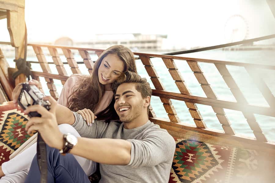 Dubai: Sunset Cruise on Traditional Boat & Emirati High Tea - Dubai’s modern skyline from a wooden Abra
