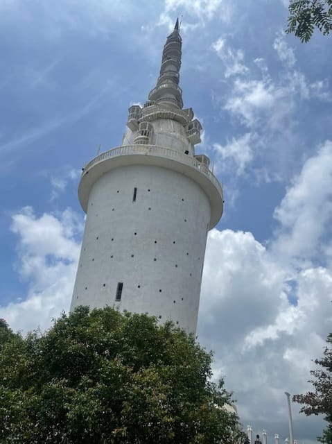 From Negombo: Ambuluwawa Tower & Tea Factory,Kandy Day Trip - The $69 price is only the starting point
