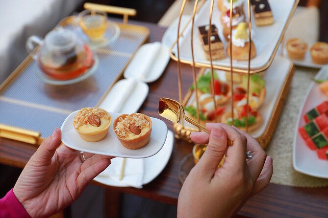 Huong River Afternoon Tea Cruise Tour Along Hue City - Tea, Cake, Fruit, and a Taste of Hue