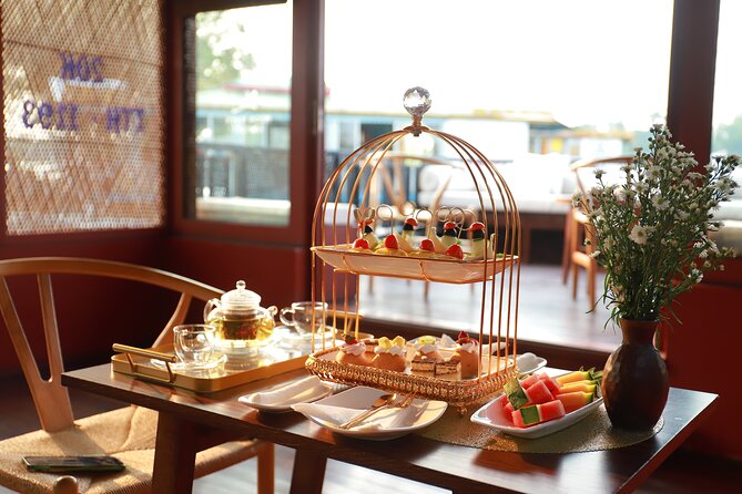 Huong River Afternoon Tea Cruise Tour Along Hue City - Quốc Học High School and the Riverside Monument