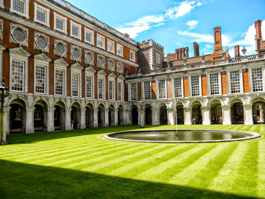 London: Royal Hampton Court Guided Tour with Afternoon Tea - Courtyards, Anne Boleyn’s gatehouse, and royal drama