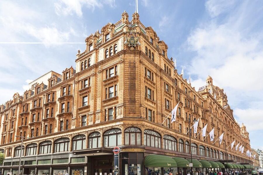London Vintage Bus Tour and Cream Tea at Harrods - Riding a vintage bus past Westminster