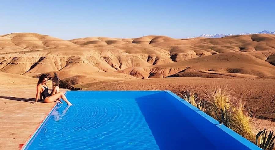 Marrakech: Agafay Desert Quad Bike, with Pool swim Lunch Tea - Riding a quad across the rocky desert