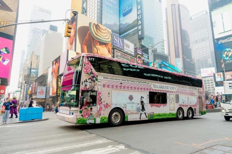 NYC: Tea Around Town Bus Tour with Live Entertainment - The New York Public Library from a tea table