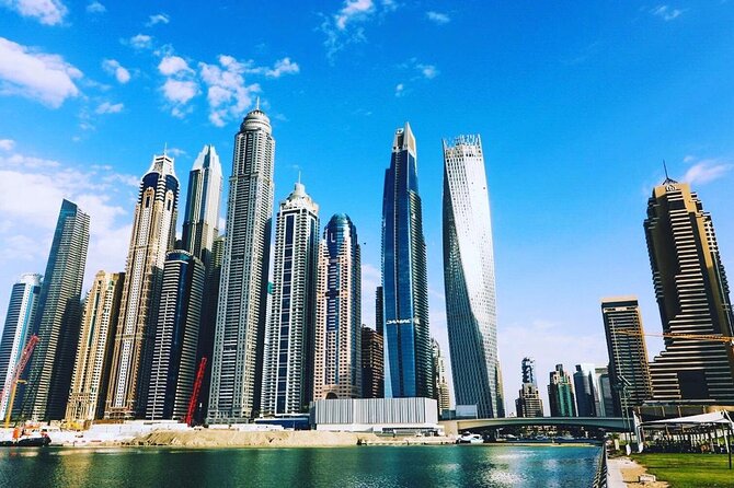 Private New Dubai Tour with Afternoon Tea in Burj al Arab and Burj Kalifa Ticket - Dubai Marina: A Short Walk Among Skyscrapers