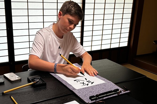 Shizuoka Shore Excursion: Zen, Matcha & Calligraphy Shimizu Port - Choosing a kanji name and practicing calligraphy