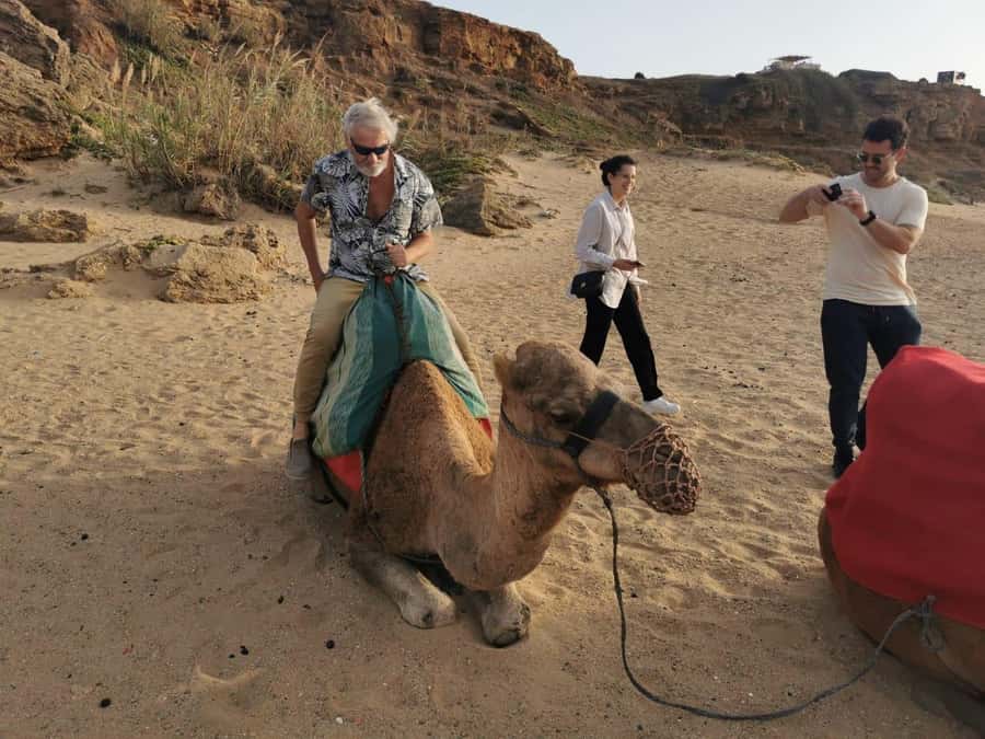 Tangier: sunset, tea, camel ride, Cape Spartel and caves. - The secret beach stop and camel ride
