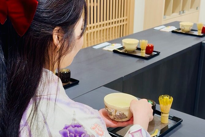Tea and Calligraphy Session at a Table in Osaka - A Two Part Introduction to Japanese Culture