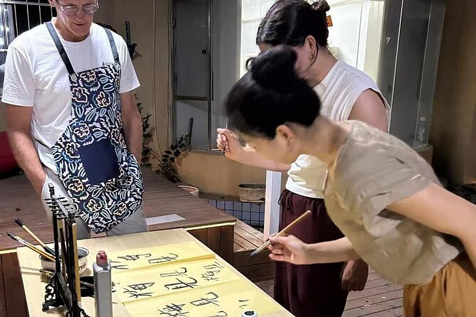 Xi'an Noodle Making and Tea Tasting Experience - The 56-stroke character and a little calligraphy